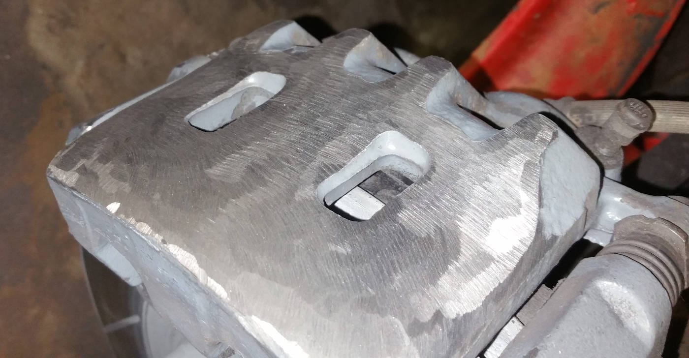 Grinding Subaru caliper